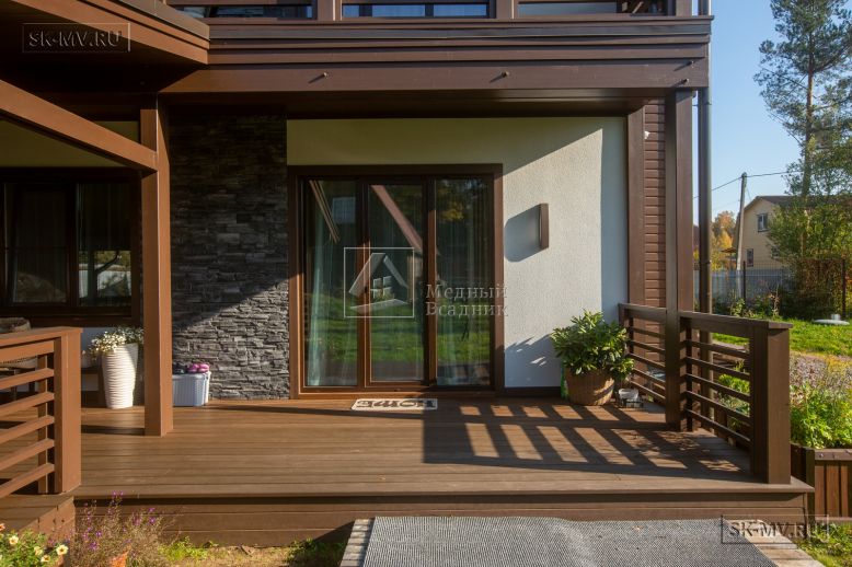 Построенный загородный дом с террасой по каркасной технологии в Сестрорецке под ключ — 10