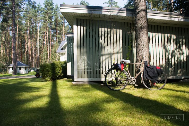 Построенный каркасный дом с комбинированной фасадной отделкой кирпичом и вагонкой в п Комарово — 6