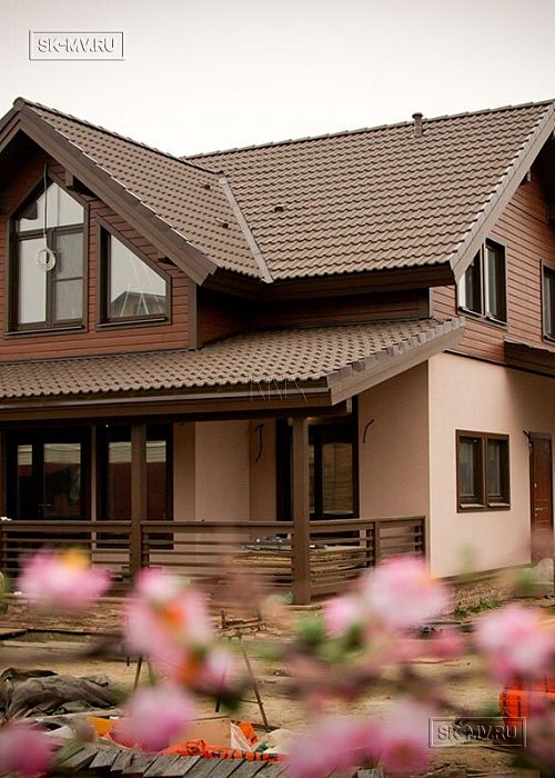 Строительство каркасного дома 190 кв м с комбинированной фасадной отделкой деревом и штукатуркой в п Жостово округ Мытищи