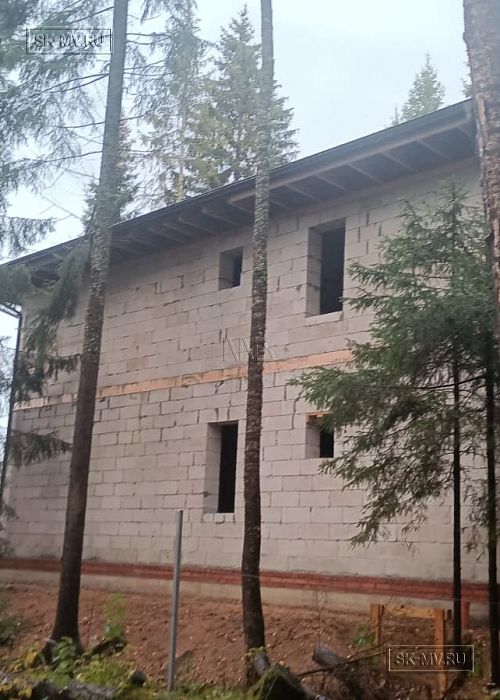 Строительство двухэтажного коттеджа с верандой и сауной