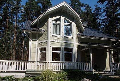 Построенный каркасный дом с комбинированной фасадной отделкой кирпичом и вагонкой в п Комарово - 11