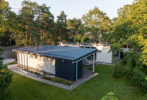 Фотографии П-образного дома в скандинавском стиле 238 кв м с панорамным остеклением, построенного в Сестрорецке - 29