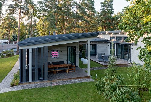 Фотографии П-образного дома в скандинавском стиле 238 кв м с панорамным остеклением, построенного в Сестрорецке - 28